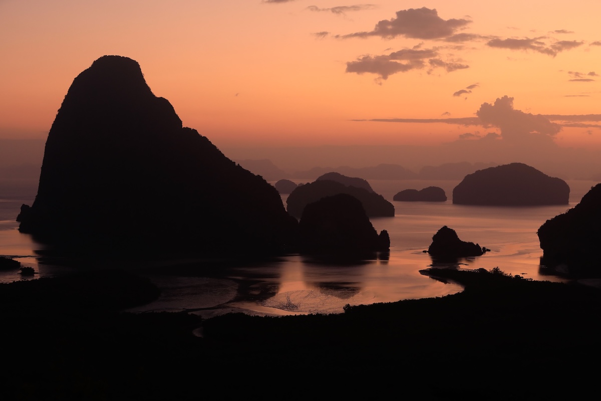 Atmospheric sunrise over the limestone islands of Phang Nga Bay